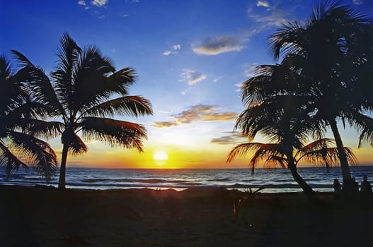 The picture was taken in 1990 and shows the beach Punta Allen near Tulum / Mexico. We got up very early to be able to experience this sunrise.