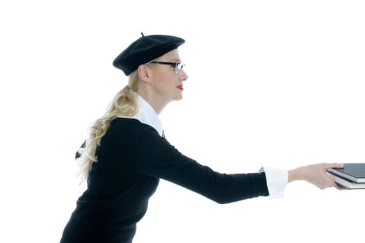 Young woman with glasses handing over books