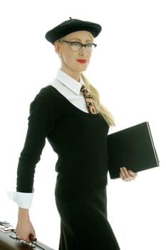 Young woman with suitcase and books