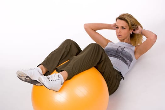 Young woman doing abdominal training