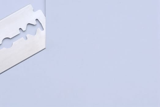 Razor blade with surface for advertising