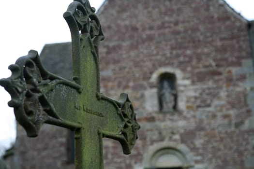 Old grave cross in front of the portal of St. Kilian's Church in Lügde (Krreis Lippe,North Rhine-Westphalia)