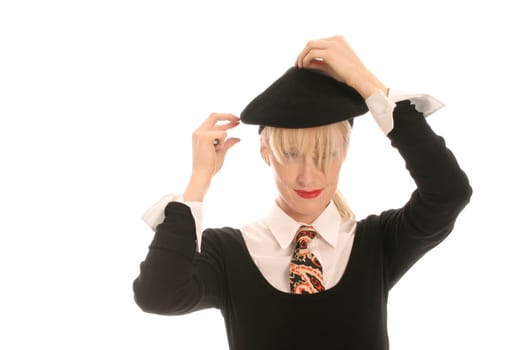 Young woman puts on cap
