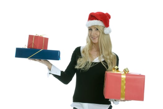 Young woman with Santa Claus hat and gifts