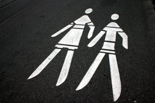 Man-and-woman symbol on tar