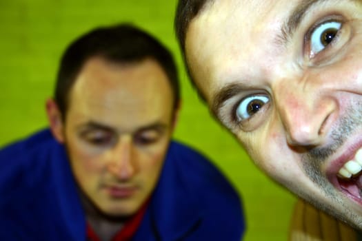 Faces of two young men