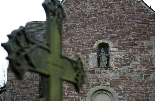 Old grave cross in front of the portal of St. Kilian's Church in Lügde (Krreis Lippe,North Rhine-Westphalia)