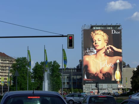 Advertising can be so beautiful as a scaffolding tarpaulin * knew how * with a small compact taken while driving ***