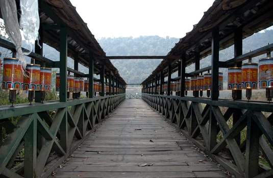 In Buddhism,prayer wheels are rotated to link physical activity and mental-spiritual content
