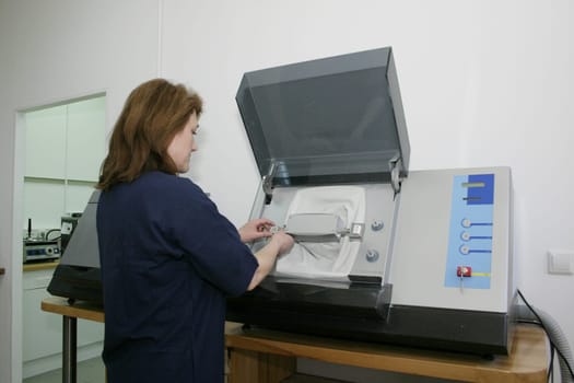 Woman in the dental laboratory