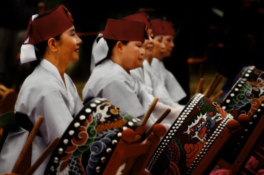 Traditionally dressed Buk players.