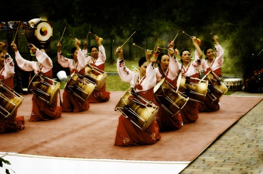 The traditional hourglass drum (Changu),played by Korean women in imperial costume by servants