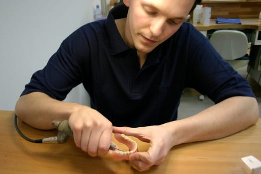 Trainee in the dental laboratory
