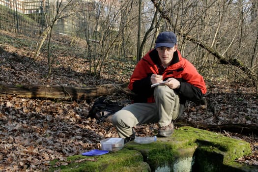 Geocaching - Treasure hunter with cache