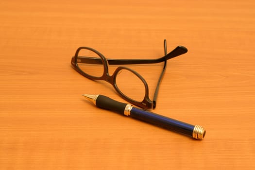 Glasses and pens