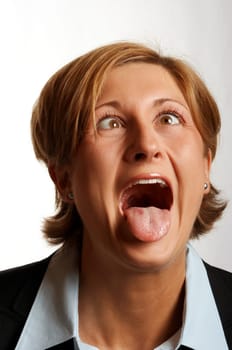 Young pretty woman with crazy facial expression - studio shot