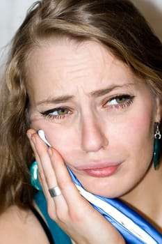 Young woman with toothache