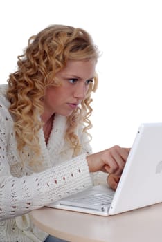 Young woman sitting at laptop