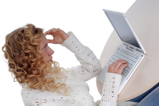 Young woman sitting at laptop