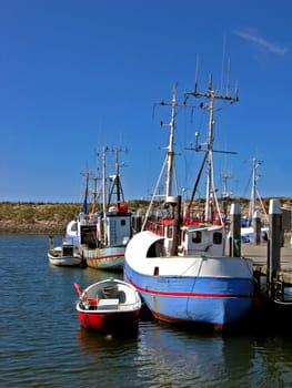 Fishing boats with dinghies