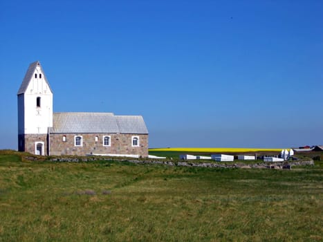 The church of Trans from the year 1200 with its special location on a cliff directly on the North Sea (unfortunately you can't see it in this setting).