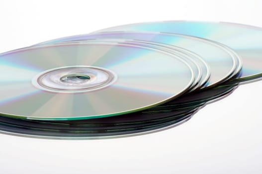 CD/DVD discs cropped against a white background with mirroring