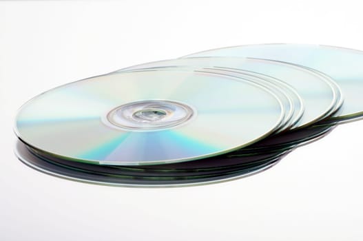 CD/DVD discs cropped against a white background with mirroring