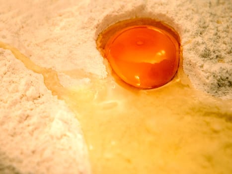 Beaten egg in flour