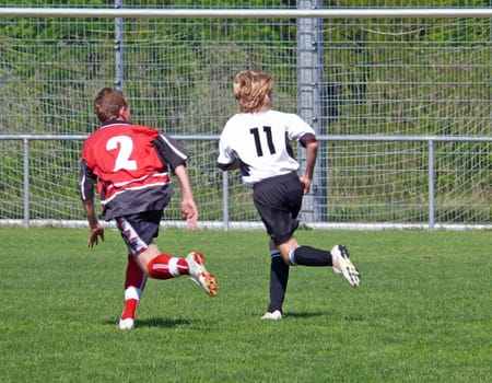 Players and opponents: strikers and defenders in wonderful harmony of movement