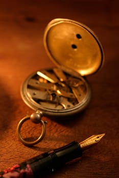 Clock and fountain pen