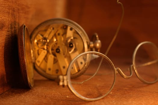 Old watch and glasses