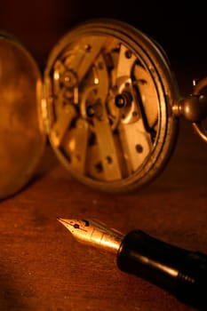 Fountain pen and pocket watch