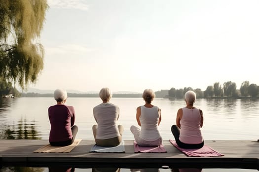 rear view of group of senior women doing yoga exercises on wooden pier in front of summer morning lake. Neural network generated in May 2023. Not based on any actual person, scene or pattern.