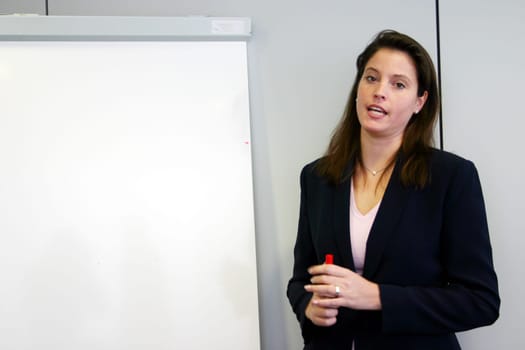 young woman at the whiteboard