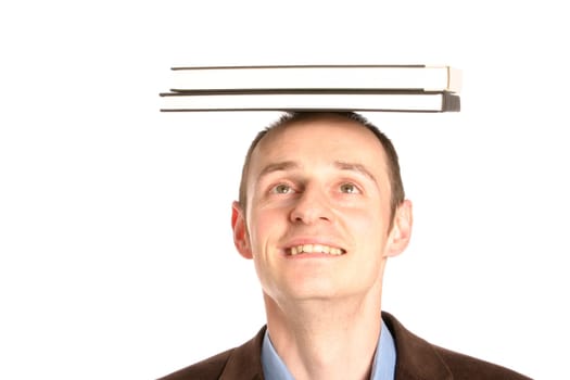 Man with stack of books on his head