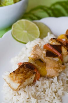 Fish skewers with rice