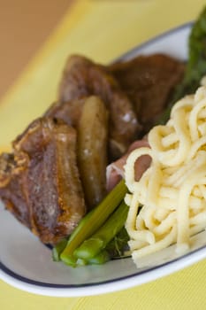 Lamb chops with spaetzle and green spa