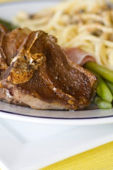 Lamb chops with spaetzle and green spa