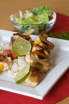 Fish skewers with rice