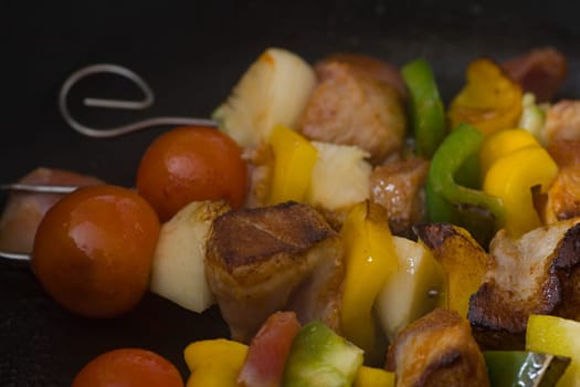 Shish kebab skewers in the pan