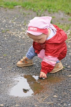At the puddle of water