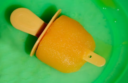 Ice cream on a green plate