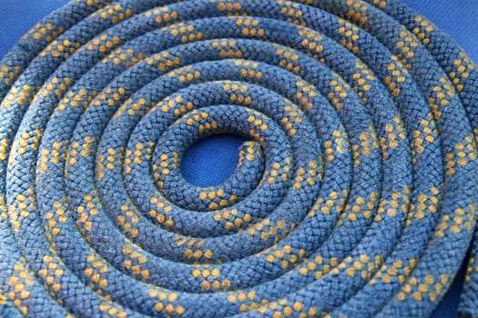 Tampen turned to a snail = screw turner,is considered an insult among sailors,just like Warmduscher. The rope should not be left on deck either,it is not good for the teak deck,the moisture retains and it becomes rott.