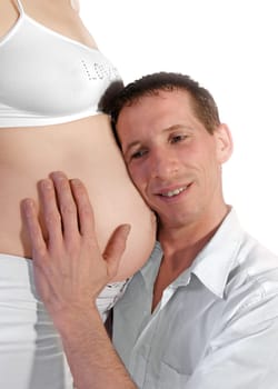 Father listens to his unborn baby
