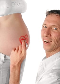 Father-to-be paints heart on baby bump