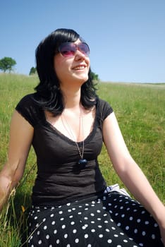 Young woman in the grass