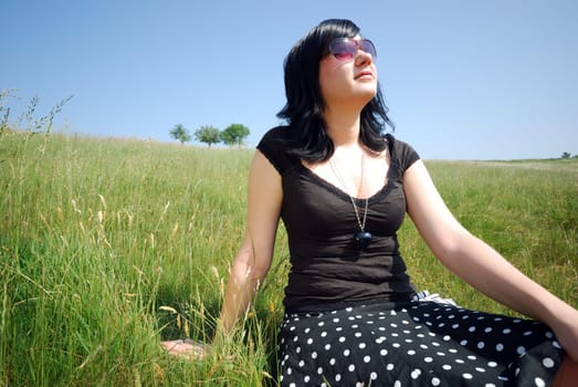 Young woman in the grass