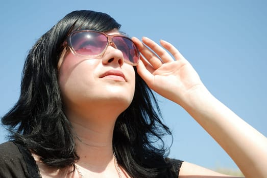 Young woman wearing sunglasses