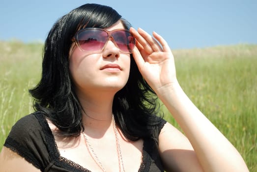 Young woman wearing sunglasses