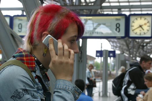 Punk girl with mobile phone